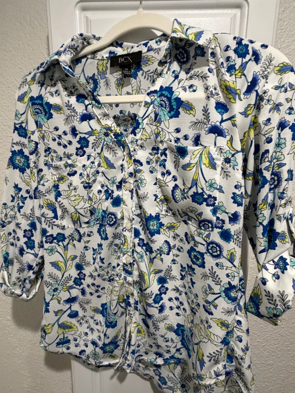 Women XS White blouse with blue flowers and yellow leaves.